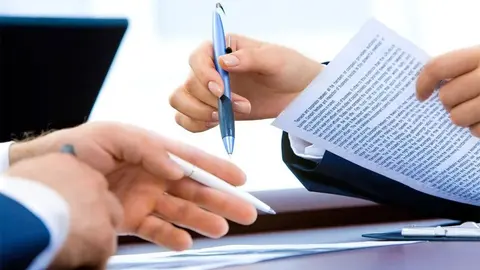 Una reunión de negocios ARCHIVO