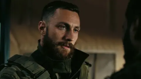 Aaron Taylor Johnson en Tenet de Christopher Nolan, un firme candidato para interpretar al próximo Bond.