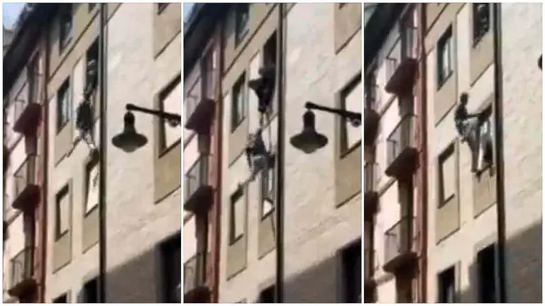 Tres fotogramas del vídeo que recoge al hombre intentando huir por la ventana de un tercer piso en la calle Tejería en Pamplona. SUP NAVARRA