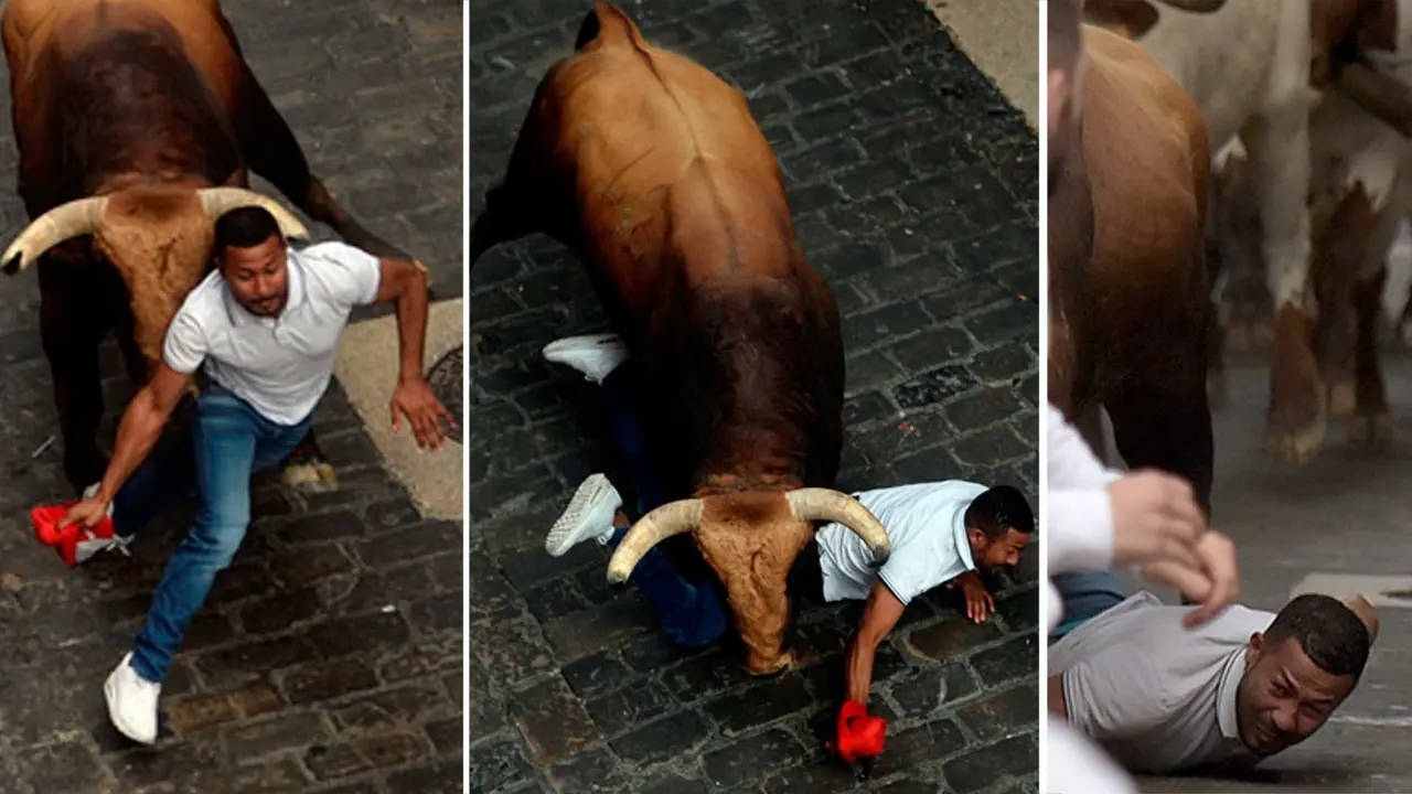 Secuencia del atropello en la Plaza del Ayuntamiento a un corredor por el toro de Puerto de San Lorenzo 'Hurac&aacute;n'. NAVARRA.COM