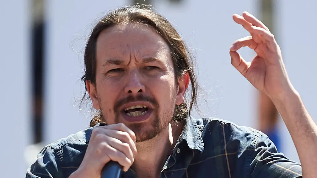 El secretario general de Podemos, Pablo Iglesias, interviene en un acto con la militancia del partido. MIGUEL OSÉS 18