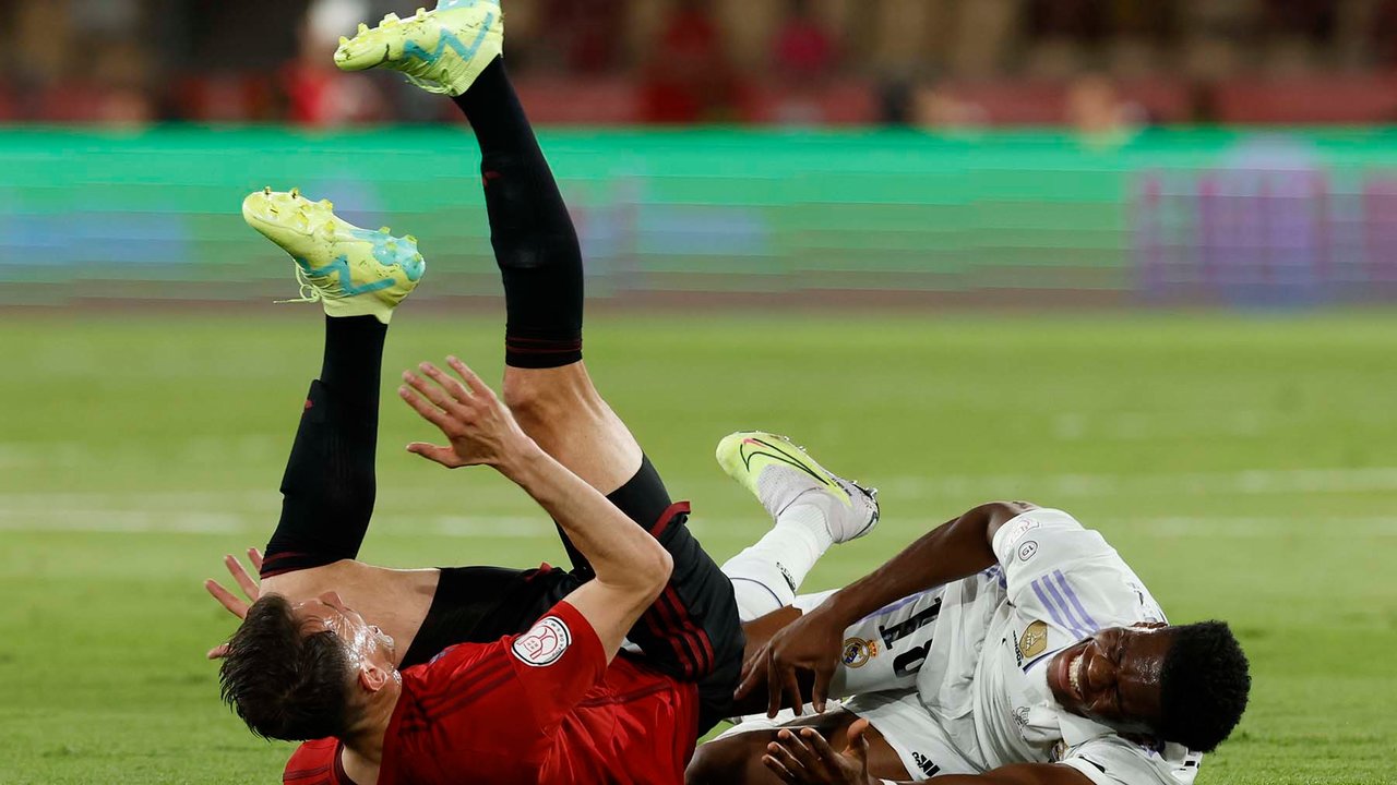 Aurelien Tchouameni of Real Madrid and Ante Budimir of CA Osasuna during  the Copa del Rey match between Real Madrid and CA Osasuna played at La  Cartuja Stadium on May 6, 2023