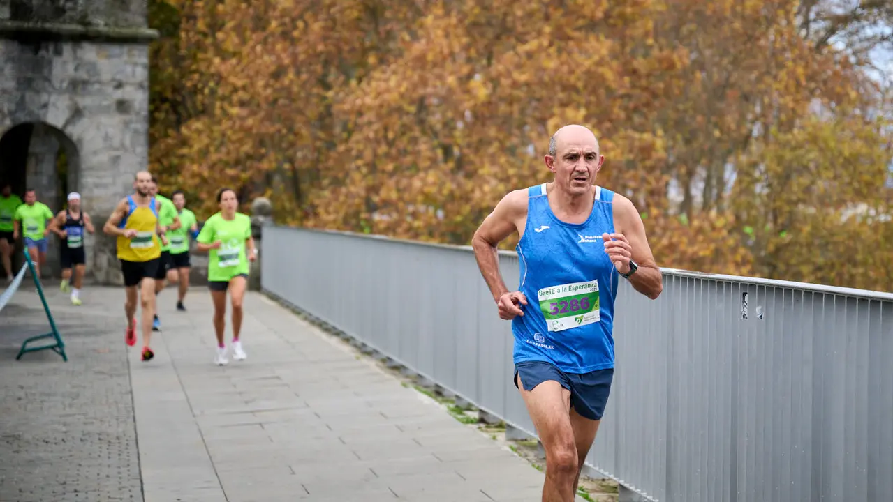 VII Carrera Popular Solidaria '+e', organizada por el Teléfono de la Esperanza de Navarra. PABLO LASAOSA