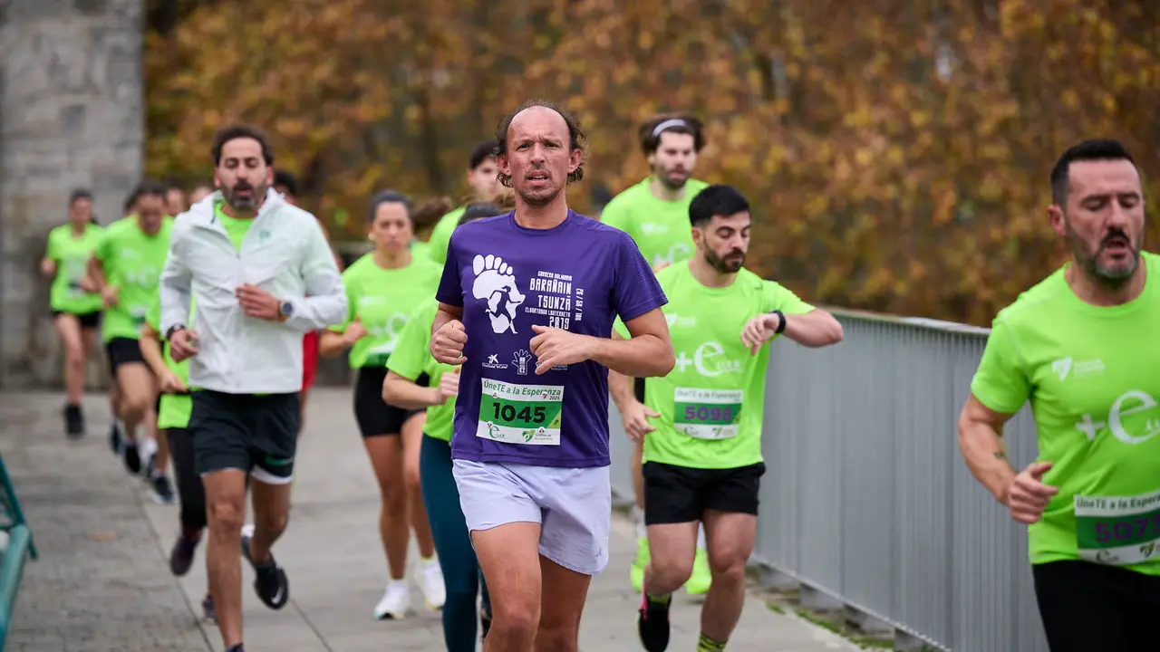 VII Carrera Popular Solidaria '+e', organizada por el Teléfono de la Esperanza de Navarra. PABLO LASAOSA