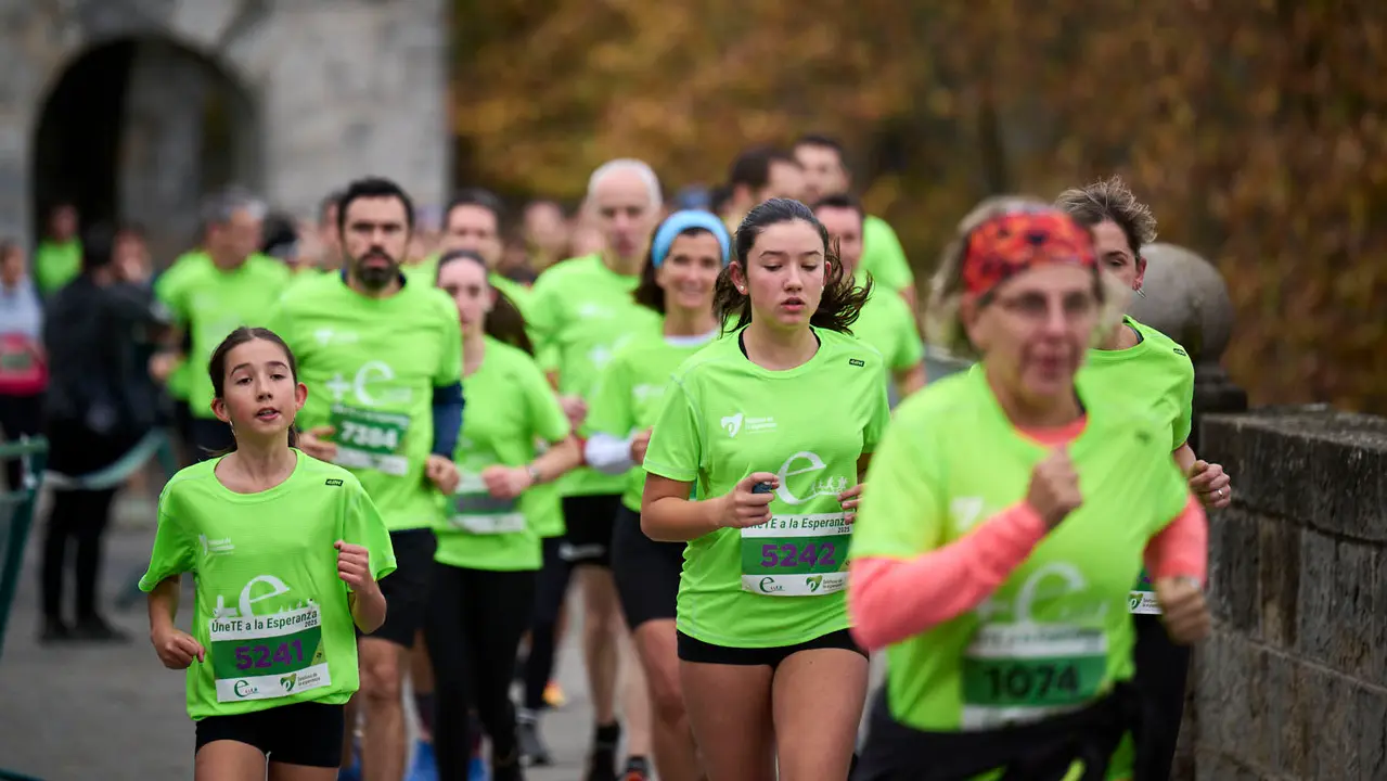 VII Carrera Popular Solidaria '+e', organizada por el Teléfono de la Esperanza de Navarra. PABLO LASAOSA