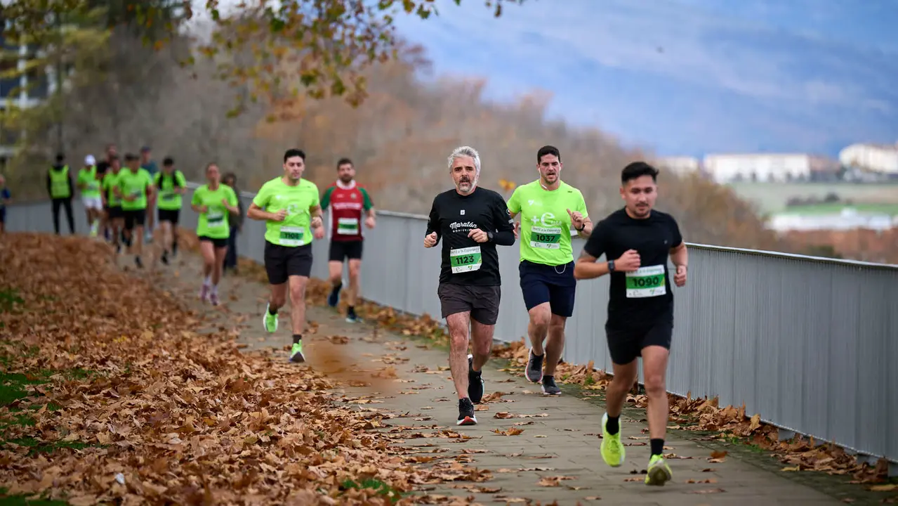 VII Carrera Popular Solidaria '+e', organizada por el Teléfono de la Esperanza de Navarra. PABLO LASAOSA