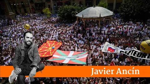 Chupinazo de fiestas de Tafalla con pancartas de plástico elaboradas por los aberzales. PABLO LASAOSA