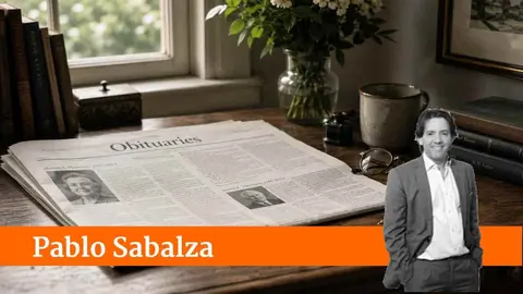 Un peri&oacute;dico abierto por la secci&oacute;n de obituarios.