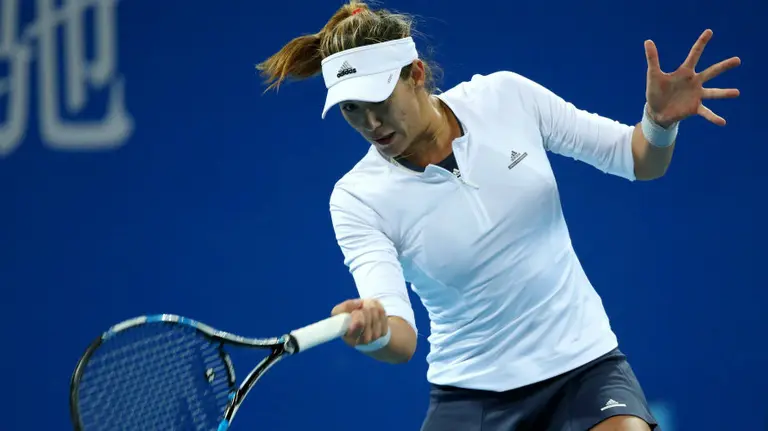 Garbiñe Muguruza triunfa en China. EFE.