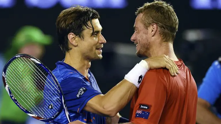 David Ferrer habla con Hewitt. Efe.