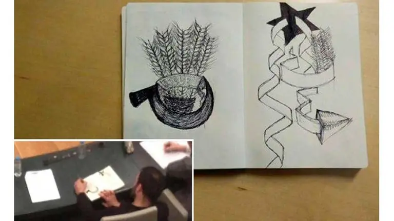 Murgui y su dibujo.OKDIARIO