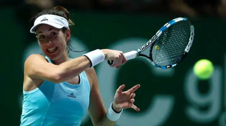 Garbiñe Muguruza devuelve una pelota en el Másters. Efe.