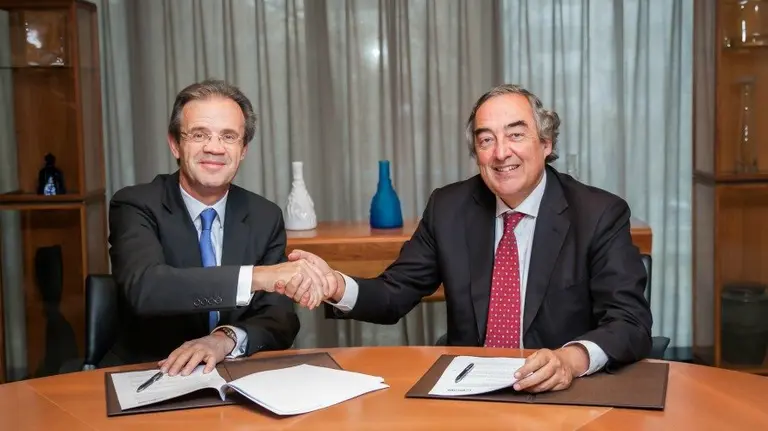 El presidente de CaixaBank, Jordi Gual, y el presidente de la Confederación Española de Organizaciones Empresariales (CEOE), Juan Rosell.