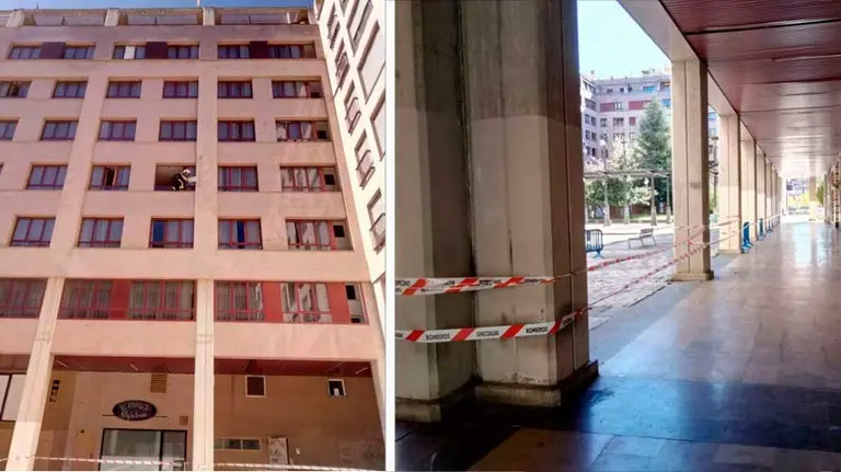 Cordón de seguridad en los porches en la plaza de Pintor Paret de Pamplona tras el desprendimiento. BOMBEROS (2)