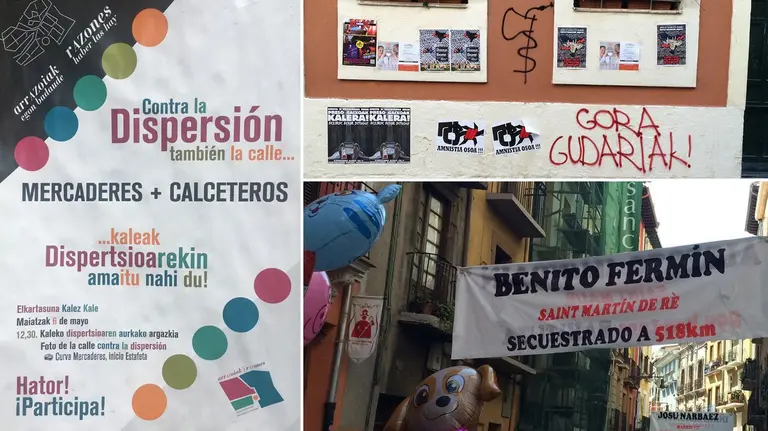 Cartel colocado en el Casco Antiguo de Pamplona convocando a los ciudadanos a un acto a favor de los presos etarras, junto con proclamas proetarras aparecidas durante San Fermín de Aldapa. NAVARRA.COM
