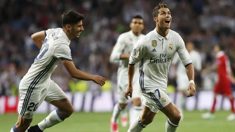 Cristiano celebra uno de sus goles al Sevilla. Lfp.