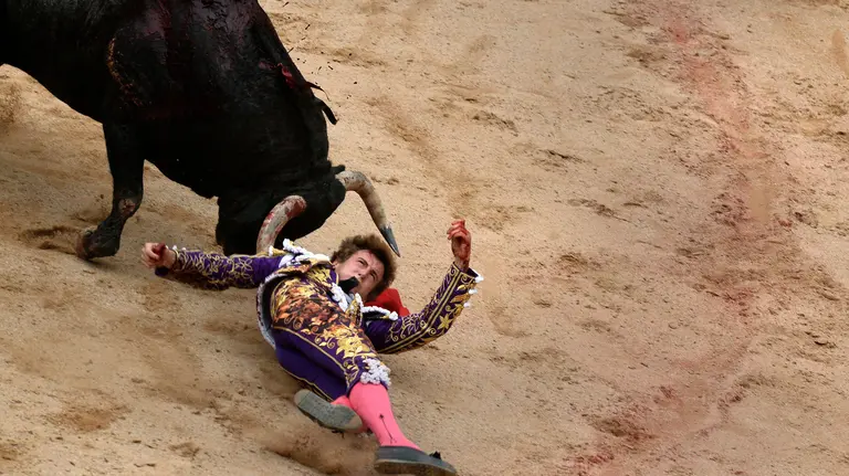 Spanish bullfighter Roman is tossed during a bullfight at the San Fermin festival in Pamplona, Spain, July 7, 2017. REUTERS/Vincent WestCODE: X00957