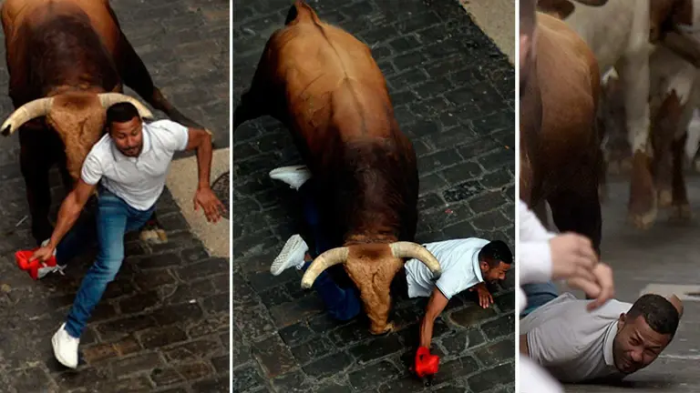 Secuencia del atropello en la Plaza del Ayuntamiento a un corredor por el toro de Puerto de San Lorenzo 'Huracán'. NAVARRA.COM