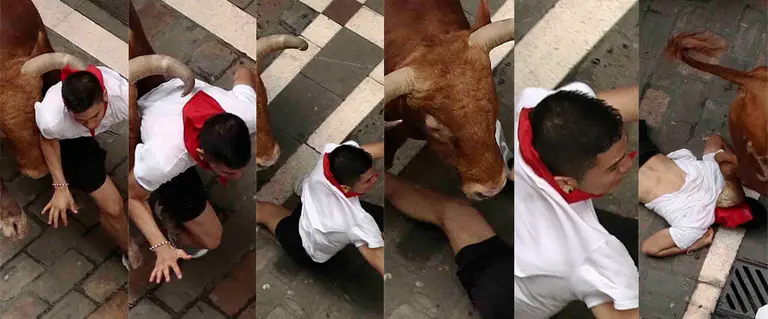 Secuencia de la embestida de un toro de los Núñez del Cuvillo a un mozo en el séptimo encierro de los Sanfermines EFE 2
