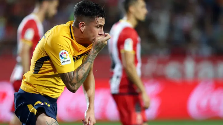 Correa y Giménez evitaron la derrota rojiblanca en Montilivi. Foto At. Madrid.