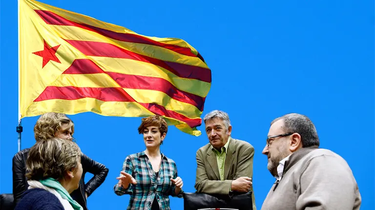 Fotomontaje del cuatripartito reunido y una estelada detrás