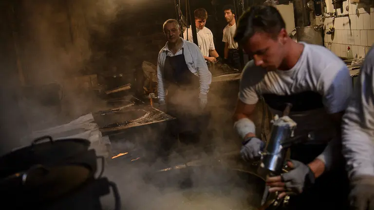 La tradicional churrería de La Mañueta durante las fiestas de San Fermín 2018. PABLO LASAOSA 05