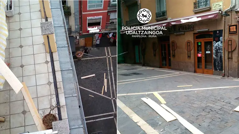 Tablones en el suelo de la calle Estafeta por las fuertes rachas de viento POLICÍA MUNICIPAL DE PAMPLONA