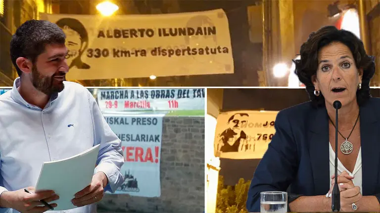 Los concejales Aritz Romeo e Itziar Gómez, de Bildu y Geroa Bai respectivamente, junto a una de las imágenes de las pancartas proetarras colocadas en San Fermín Chiquito. NAVARRA.COM