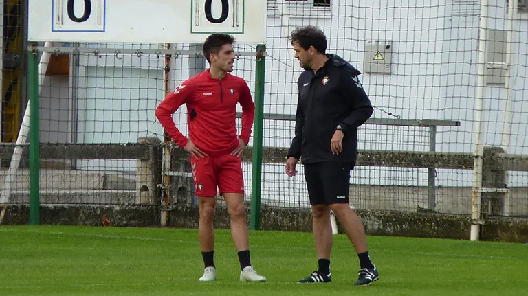 Nacho Vidal con el preparador físico en Tajonar.