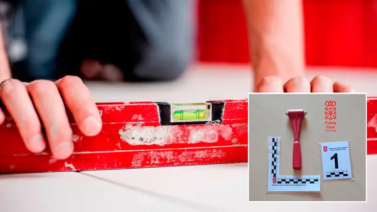 Un operario realiza tareas en una obra y, al lado, el martillo empleado por el detenido en Pamplona