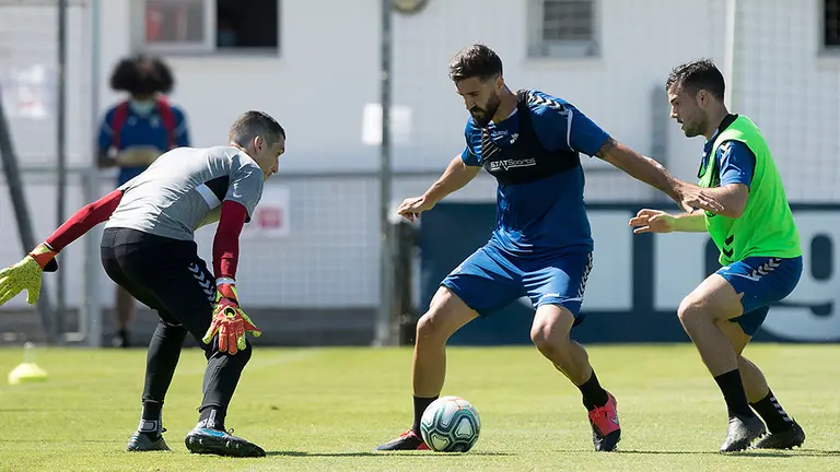 Los jugadores rojillos Sergio Herrera, Raúl Navas y José Arnaiz en Tajonar. CA Osasuna.