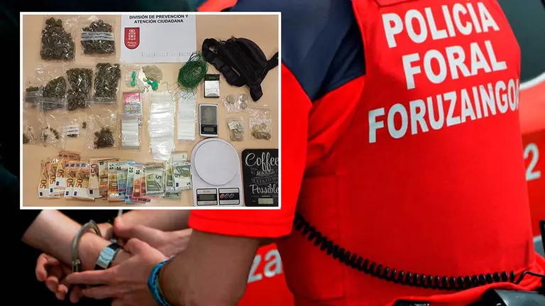 Agente de Policía Foral detiene a una persona y la lleva esposada. PF