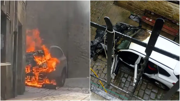 Espectacular incendio de un coche en la calle Cuesta del Colaino.
