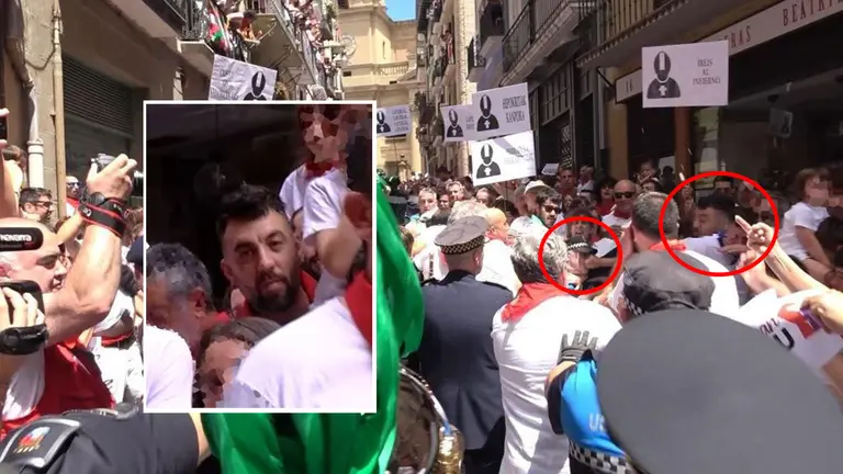 El abertzale que agredió de un puñetazo a un policía municipal en la calle Curia en la procesión de San Fermín es un vecino de 40 años de Mutilva que ya ha sido detenido. NAVARRA-COM
