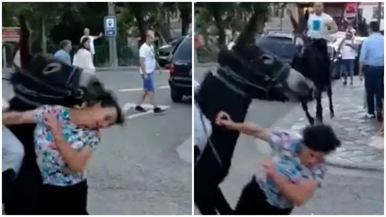 El brutal impacto de un burro a una mujer en una carrera de fiestas populares.