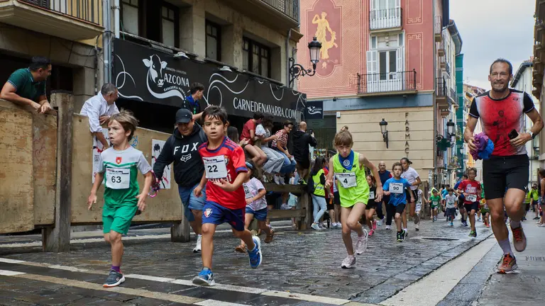 XXXVIII Carrera del Encierro organizada por la peña La Jarana de Pamplona y en la que se recorren los 799 metros del encierro en cinco categorías diferentes categorías. IÑIGO ALZUGARAY