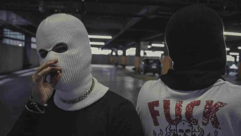 Imagen de dos sicarios. TREE ANDREE / UNSPLASH