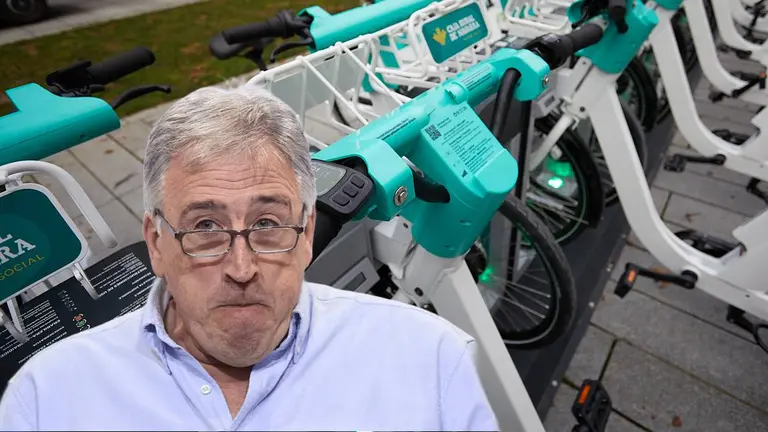 Fotomontaje con una imagen de Joseba Asiron sobre una fotograf&iacute;a de bicicletas el&eacute;ctricas de Pamplona. NAVARRA.COM