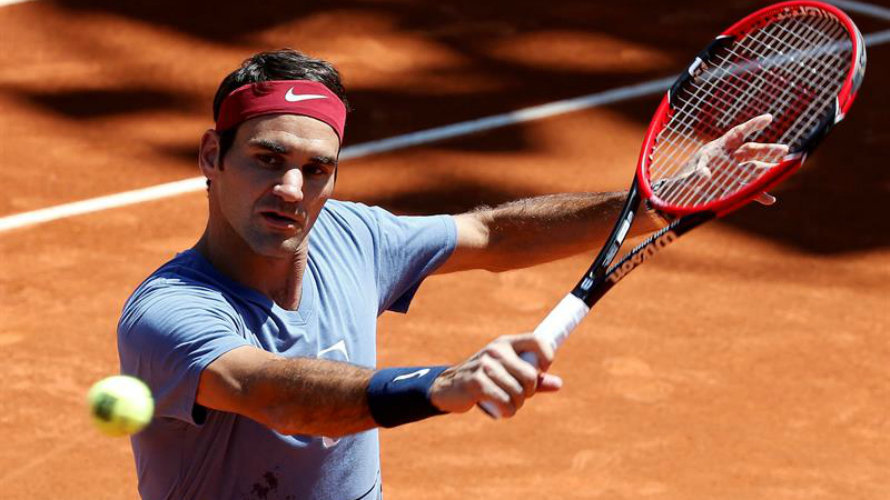Roger Federer en acción. Foto Efe.