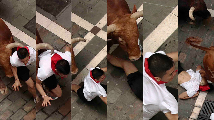 Secuencia de la embestida de un toro de los Núñez del Cuvillo a un mozo en el séptimo encierro de los Sanfermines EFE