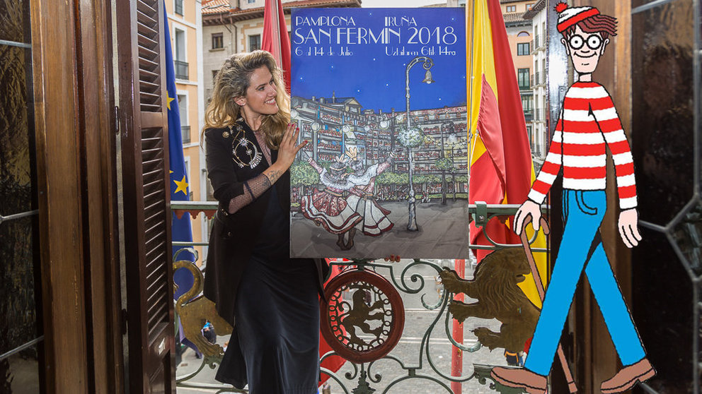 Adriana Eransun, la autora del cartel de San Fermín, junto con su obra y el clásico personaje de libros Wally. IÑIGO ALZUGARAY
