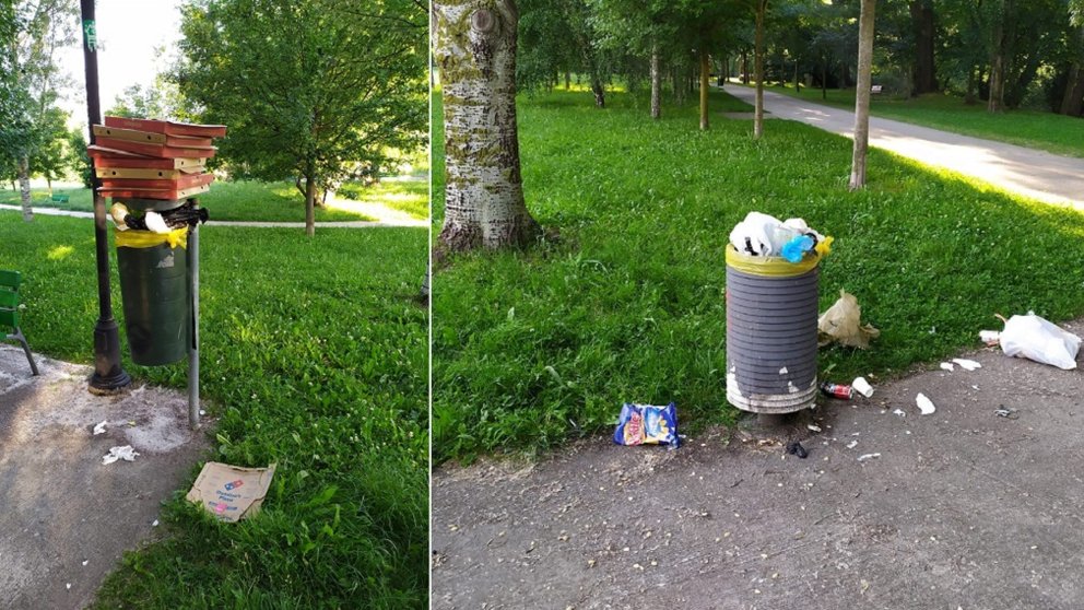 Dos papeleras y el suelo lleno de basura en un parque de Pamplona. CEDIDA PSN