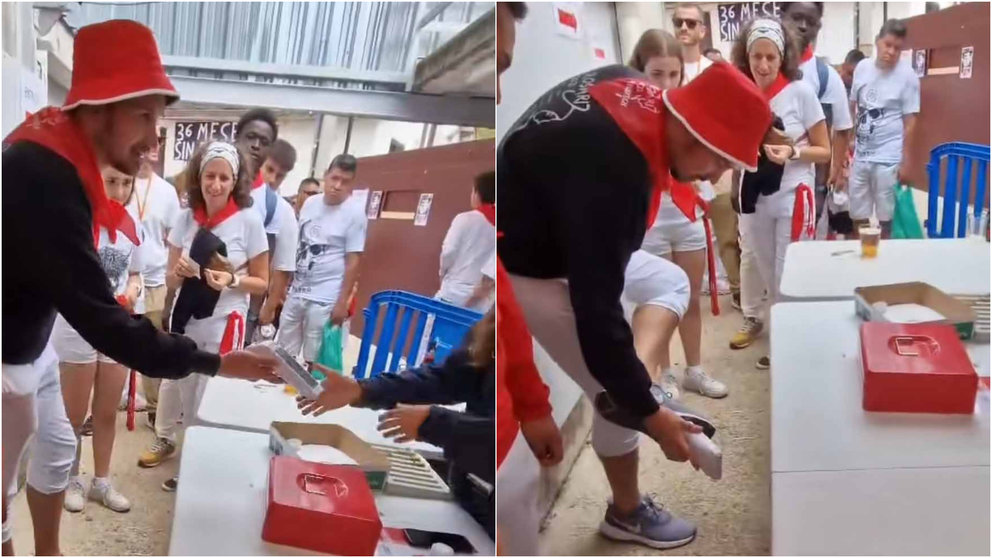 Un joven paga con su zapatilla en los Corrales del Gas en Pamplona. NAVARRA.COM