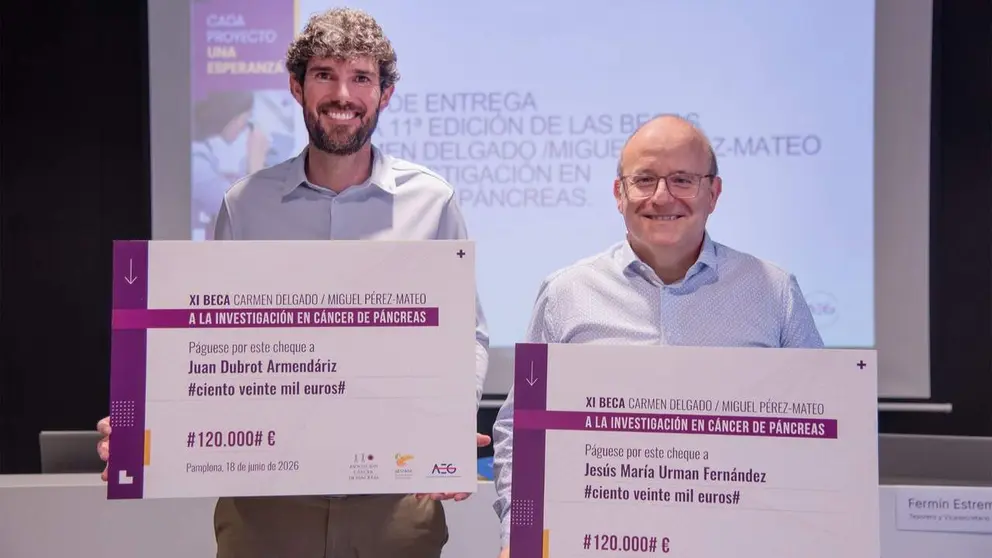 Juan Dubrot (CIMA Universidad de Navarra) y Jes&uacute;s Mar&iacute;a Urman (HUN &ndash; Navarrabiomed), ganadores de las XI Becas Carmen Delgado/Miguel P&eacute;rez-Mateo. ELISA RETA / NAVARRABIOMED-FMS