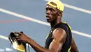 Usain Bolt de Jamaica celebra su victoria en la final de 100 m masculino de la competencia de atletismo en los Juegos Olímpicos Río 2016. EFE/ANTONIO LACERDA