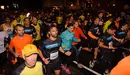 La nueva edición de la Carrera de las Murallas reúne a miles de corredores en Pamplona. MIGUEL OSÉS (30)