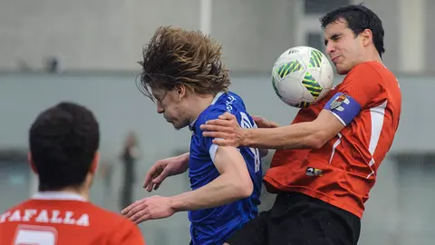 Las imágenes del partido disputado entre Txantrea y Peña Sport. MIGUEL OSÉS (11)