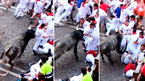 Cogida-en-la-Plaza-del-Ayuntameinto-a-un-corredor-en-el-encierro-del-7-dejulio-de-2017-protagonizado-por-la-ganadaría-de-Cebada-Gago.-S