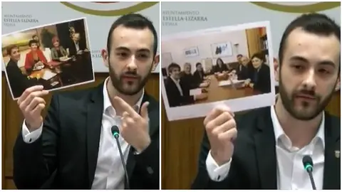 Jorge Crespo, concejal del PSN en Estella, muestra dos fotos de dirigentes del PSN reunidos y pactando con responsables de Bildu. FOTO NAVARRA TELEVISIÓN