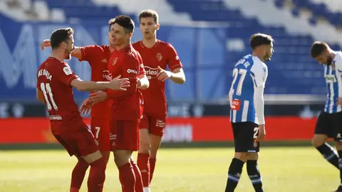 Roncaglia y Barja celebran el segundo gol rojillo ante el Espanyol. CA Osasuna.